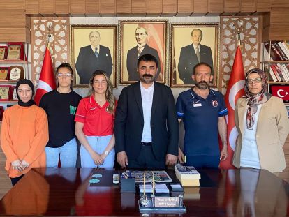 Dünya Şampiyonundan MHP'ye ziyaret