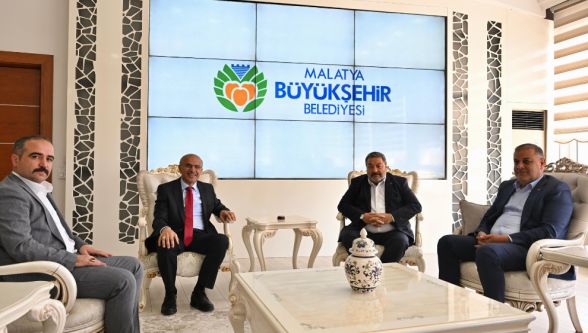 MHP'den Sami Er'e ‘Hayırlı olsun' ziyareti..